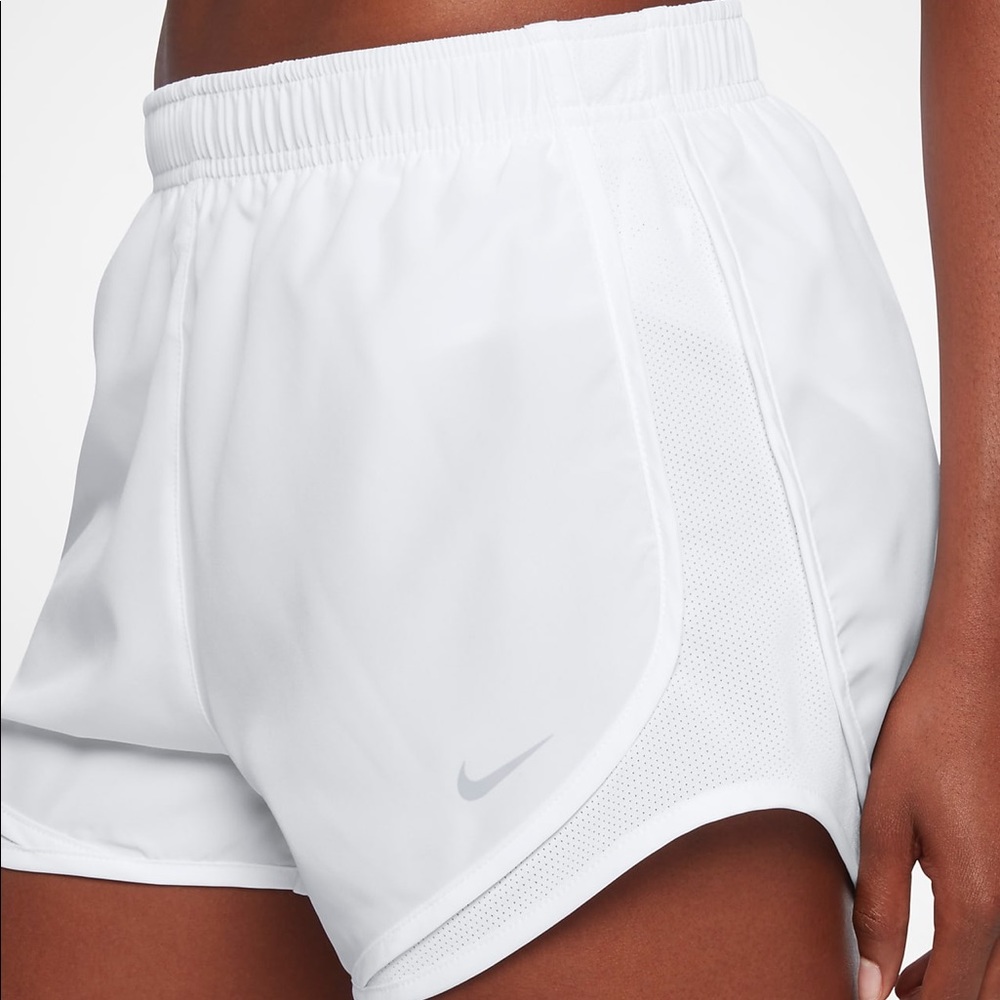 White Nike women’s running shorts.